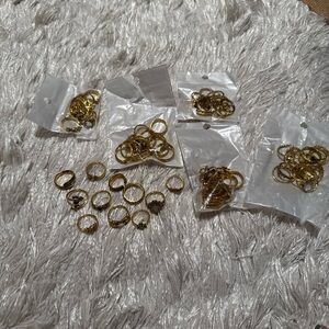 Gold toned rings in assorted shapes and sizes 6 bags available